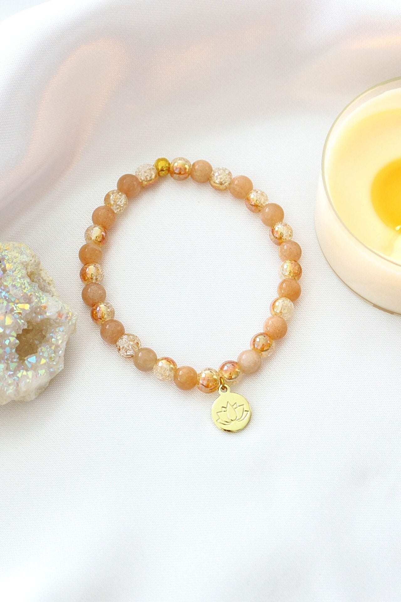 Sunstone Elastic Bracelet with 24K Gold Lotus Charm – A Symbol of Luck & Vitality