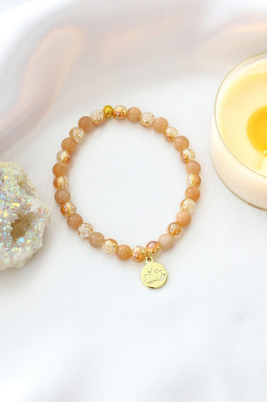 Sunstone Elastic Bracelet with 24K Gold Lotus Charm – A Symbol of Luck & Vitality