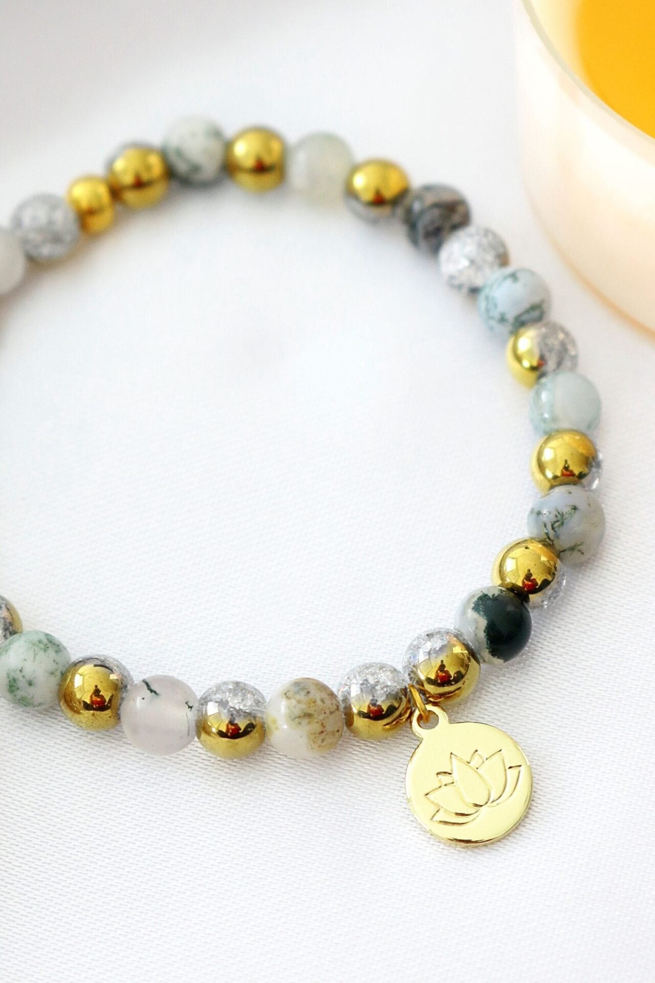 Mossy Agate Elastic Bracelet with 24K Gold Lotus Charm – A Symbol of Spiritual Growth