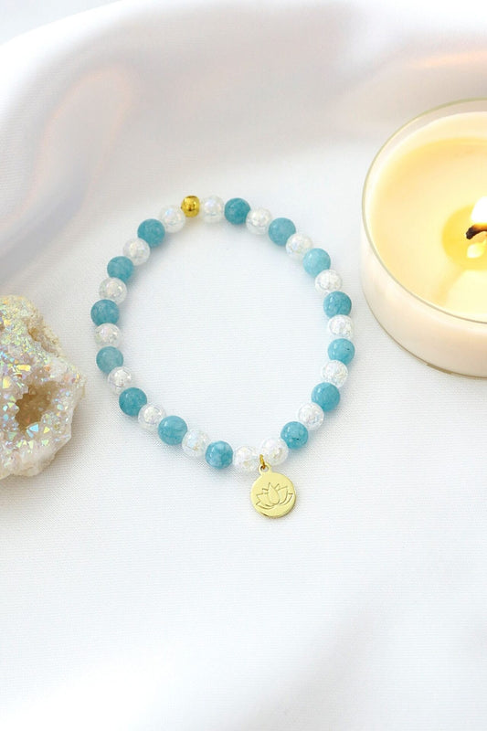 "Serenity & Light" – Aquamarine Elastic Bracelet with 24K Lotus Flower Charm